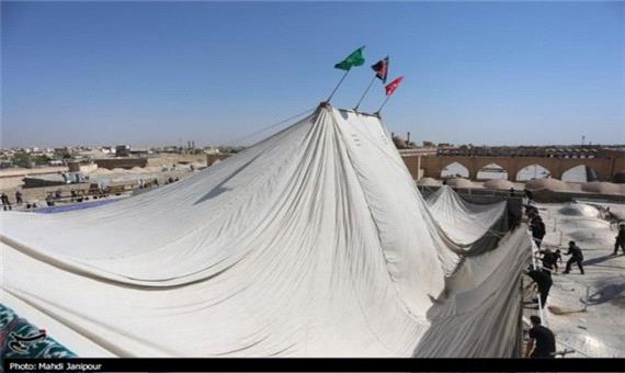 آیین برافراشته شدن خیمه حسینیه امامزاده هارونیه اصفهان برگزار شد